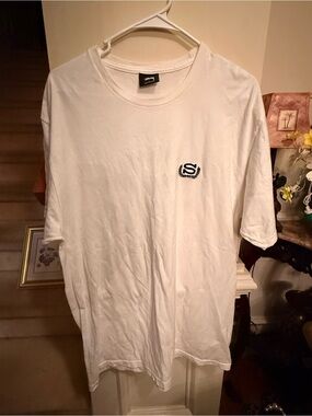Stussy Embroidered White Short Sleeve Tee with Small Black Chest Logo